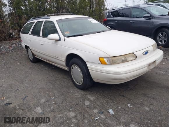 ✅ 1994 Ford Taurus GL • VIN: 1FALP57U4RG263732 • Lot: 43801365. Listed on IAAI with 141,636 mi. Free auction sales archive from the USA and detailed vehicle history report at DreamBid. Image 1.