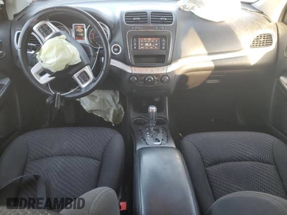 2018 Dodge Journey SE with VIN 3C4PDCAB0JT427879, listed as a Copart auction lot 82583695 with 80,549 mi miles and Salvage title. Bid and sale history available at DreamBid. Image 8.