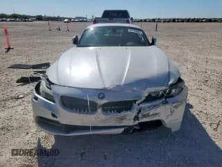 ✅ 2012 BMW Z4 sDrive35i • VIN: WBALM7C56CE385084 • Lot: 91785055. Wystawiony na Copart z przebiegiem 97 246 mil. Bezpłatny archiwum sprzedaży aukcyjnych z USA i szczegółowy raport historii pojazdu na DreamBid. Zdjęcie 5.