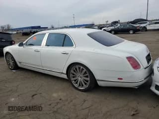 ✅ 2016 Bentley Mulsanne • VIN: SCBBF7ZH9GC002186 • Lot: 77436604. Wystawiony na Copart z przebiegiem Nie podano. Bezpłatny archiwum sprzedaży aukcyjnych z USA i szczegółowy raport historii pojazdu na DreamBid. Zdjęcie 2.