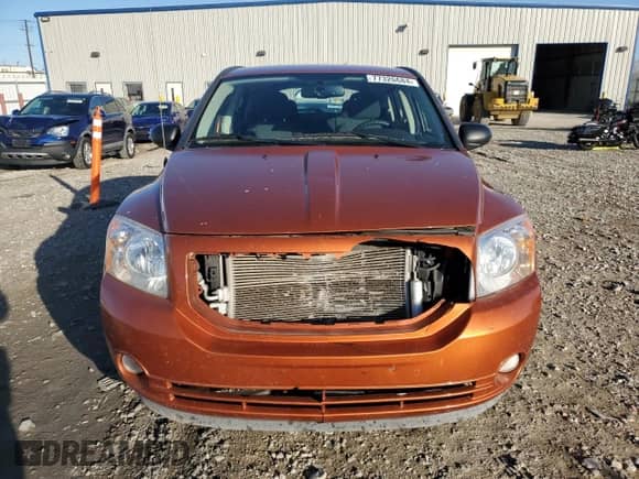2011 Dodge Caliber Mainstreet с VIN 1B3CB3HA7BD296055, выставлен на аукционе Copart как лот 77326684 с пробегом 158 123 миль миль и На запчасти • Non repairable. История ставок и продаж доступна на DreamBid. Изображение 5.