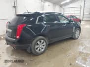 ✅ 2014 Cadillac SRX Luxury Collection • VIN: 3GYFNEE35ES682282 • Lot: 43699743. Listed on IAAI with 115,235 mi. Free auction sales archive from the USA and detailed vehicle history report at DreamBid. Image 4.