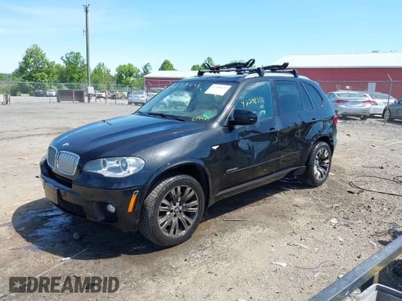 ✅ 2013 BMW X5 xDrive50i • VIN: 5UXZV8C54D0C15421 • Lot: 42298535. Listed on IAAI with 118,890 mi. Free auction sales archive from the USA and detailed vehicle history report at DreamBid. Image 17.