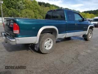 1999 Dodge Dakota SLT z VIN 1B7GG22Y1XS285749, wystawiony jako Copart lot #73038674 z przebiegiem 153 048 mil mil oraz Szkoda całkowita • Salvage title. Historia ofert i sprzedaży dostępna na DreamBid. Obrazek 3.
