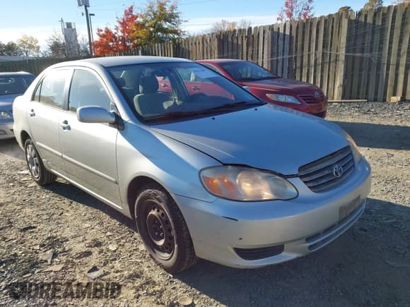 ✅ 2003 Toyota Corolla CE • VIN: JTDBR32E532015353 • Lot: 43631887. Listed on IAAI with 239,694 mi. Free auction sales archive from the USA and detailed vehicle history report at DreamBid. Image 1.