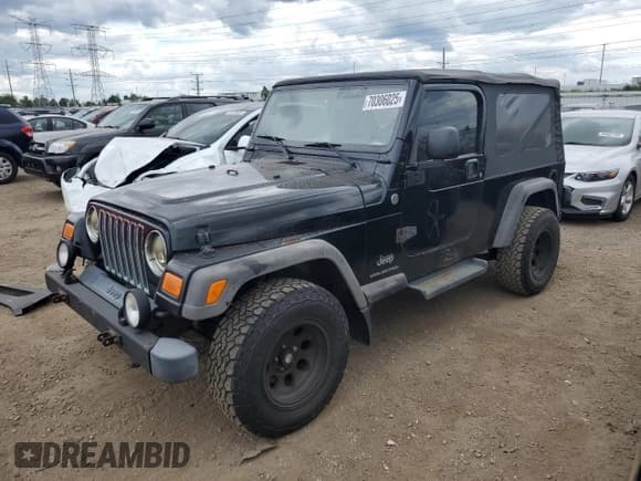 ✅ 2005 Jeep Wrangler Unlimited • VIN: 1J4FA44S25P335120 • Lot: 70306025. Listed on Copart with 137,315 mi. Free auction sales archive from the USA and detailed vehicle history report at DreamBid. Image 1.