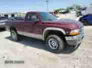 2000 Dodge Dakota Sport z VIN 1B7GG26N5YS546673, wystawiony jako Copart lot #54512715 z przebiegiem 140 904 mil mil oraz Czysty tytuł • Clean title. Historia ofert i sprzedaży dostępna na DreamBid. Obrazek 4.