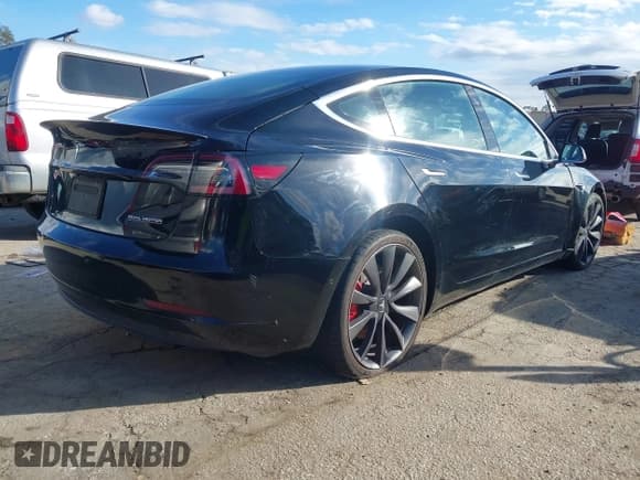 ✅ 2020 Tesla Model 3 Performance • VIN: 5YJ3E1EC7LF741937 • Lot: 43741182. Listed on IAAI with 60,739 mi. Free auction sales archive from the USA and detailed vehicle history report at DreamBid. Image 4.