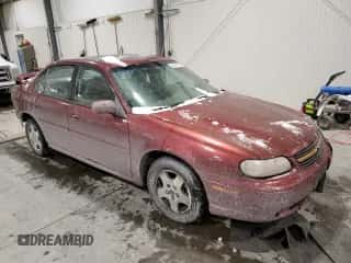 2003 Chevrolet Malibu LS z VIN 1G1NE52J73M705992, wystawiony jako Copart lot #45948115 z przebiegiem 142 492 mil mil oraz Szkoda całkowita • Salvage title. Historia ofert i sprzedaży dostępna na DreamBid. Obrazek 4.