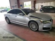 ✅ 2016 Audi A6 Premium • VIN: WAUFFAFC1GN124742 • Lot: 68173615. Listed on Copart with 115,675 mi. Free auction sales archive from the USA and detailed vehicle history report at DreamBid. Image 4.