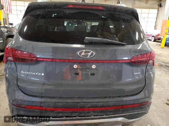 2022 Hyundai Santa Fe SEL z VIN 5NMS3DAJ2NH430411, wystawiony jako Copart lot #69762502 z przebiegiem 9 920 mil mil oraz . Historia ofert i sprzedaży dostępna na DreamBid. Obrazek 6.