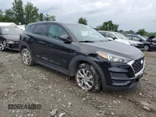 2019 Hyundai Tucson SE z VIN KM8J23A45KU024562, wystawiony jako Copart lot #64594605 z przebiegiem 59 226 mil mil oraz Szkoda całkowita • Salvage title. Historia ofert i sprzedaży dostępna na DreamBid. Obrazek 4.