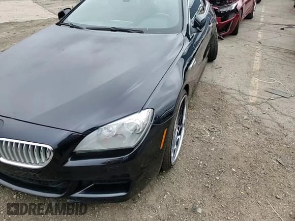 ✅ 2012 BMW 6 Series 650i xDrive • VIN: WBALZ5C57CC619766 • Лот: 63023705. Опубликован ранее на Copart с пробегом 109 856 миль. Бесплатный доступ к архиву аукционных продаж из США и подробный отчёт об истории автомобиля на DreamBid. Изображение 13.
