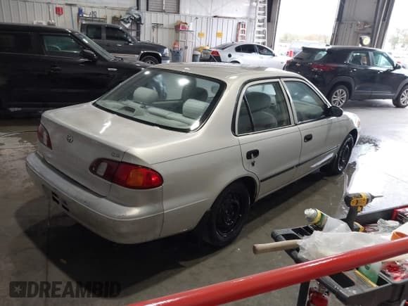 ✅ 1999 Toyota Corolla CE • VIN: 1NXBR12E7XZ251058 • Lot: 43552279. Listed on IAAI with 271,732 mi. Free auction sales archive from the USA and detailed vehicle history report at DreamBid. Image 4.