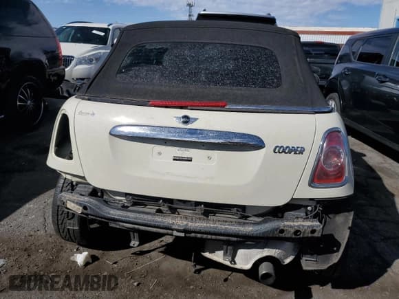 ✅ 2014 MINI Convertible • VIN: WMWZN3C59ET569823 • Лот: 72543194. Опубликован ранее на Copart с пробегом 56 730 миль. Бесплатный доступ к архиву аукционных продаж из США и подробный отчёт об истории автомобиля на DreamBid. Изображение 6.