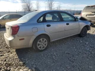 ✅ 2005 Suzuki Forenza S • VIN: KL5JD56Z95K119565 • Lot: 43051135. Wystawiony na Copart z przebiegiem 143 172 mil. Bezpłatny archiwum sprzedaży aukcyjnych z USA i szczegółowy raport historii pojazdu na DreamBid. Zdjęcie 3.