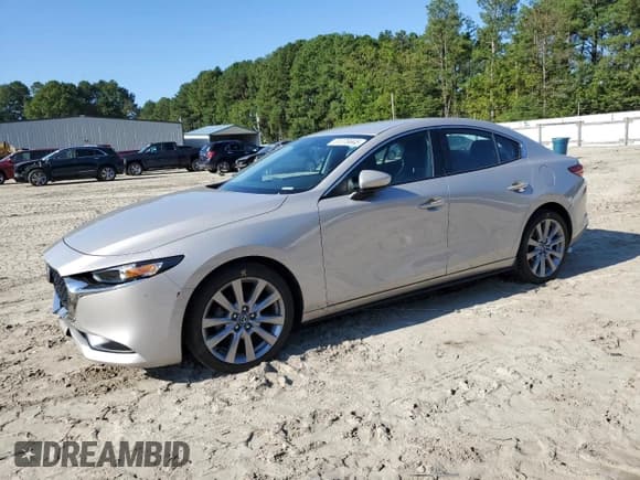 ✅ 2022 Mazda 3 Select • VIN: 3MZBPABL1NM306076 • Лот: 81376845. Опубликован ранее на Copart с пробегом 25 973 миль. Бесплатный доступ к архиву аукционных продаж из США и подробный отчёт об истории автомобиля на DreamBid. Изображение 1.