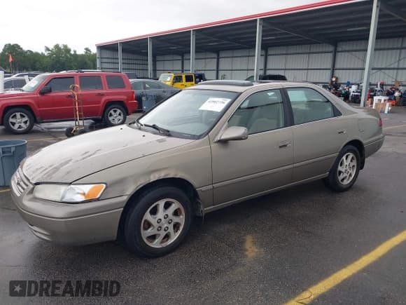 ✅ 1999 Toyota Camry LE • VIN: JT2BF22K9X0226073 • Lot: 42902726. Listed on IAAI with 264,241 mi. Free auction sales archive from the USA and detailed vehicle history report at DreamBid. Image 6.