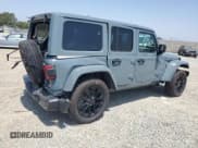 ✅ 2024 Jeep Wrangler Sahara • VIN: 1C4RJXP62RW228115 • Lot: 69132165. Listed on Copart with 6,032 mi. Free auction sales archive from the USA and detailed vehicle history report at DreamBid. Image 3.