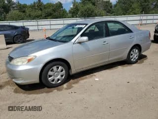 ✅ 2002 Toyota Camry LE • VIN: 4T1BE32K32U087099 • Lot: 62587675. Listed on Copart with 238,376 mi. Free auction sales archive from the USA and detailed vehicle history report at DreamBid. Image 1.