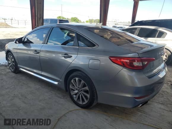 2015 Hyundai Sonata Sport with VIN 5NPE34AF0FH251233, listed as a Copart auction lot 85766045 with 114,579 mi miles and Salvage title. Bid and sale history available at DreamBid. Image 2.