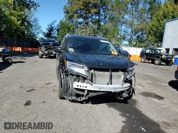 ✅ 2019 Honda Pilot Touring 8-Passenger • VIN: 5FNYF6H90KB089256 • Лот: 85352265. Опубликован ранее на Copart с пробегом 77 670 миль. Бесплатный доступ к архиву аукционных продаж из США и подробный отчёт об истории автомобиля на DreamBid. Изображение 14.