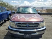✅ 1997 Ford F-150 XL • VIN: 1FTEX17L2VNB18102 • Lot: 66221125. Wystawiony na Copart z przebiegiem 172 793 mil. Bezpłatny archiwum sprzedaży aukcyjnych z USA i szczegółowy raport historii pojazdu na DreamBid. Zdjęcie 5.