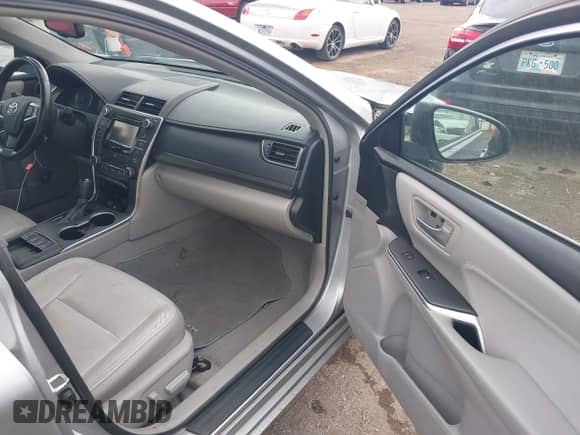 2015 Toyota Camry LE with VIN 4T1BD1FK2FU168750, listed as a IAAI auction lot 42676958 with 128,327 mi miles and . Bid and sale history available at DreamBid. Image 5.