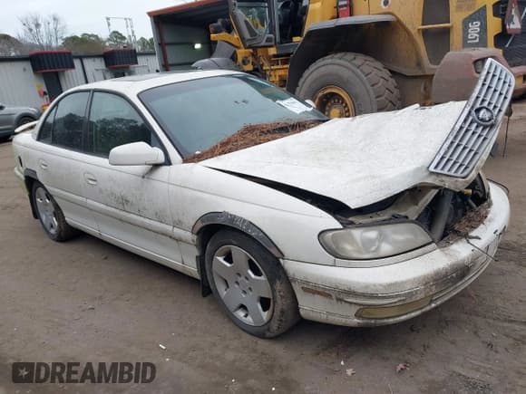 ✅ 2001 Cadillac Catera • VIN: W06VR54R31R002275 • Lot: 41328461. Listed on IAAI with 140,400 mi. Free auction sales archive from the USA and detailed vehicle history report at DreamBid. Image 1.