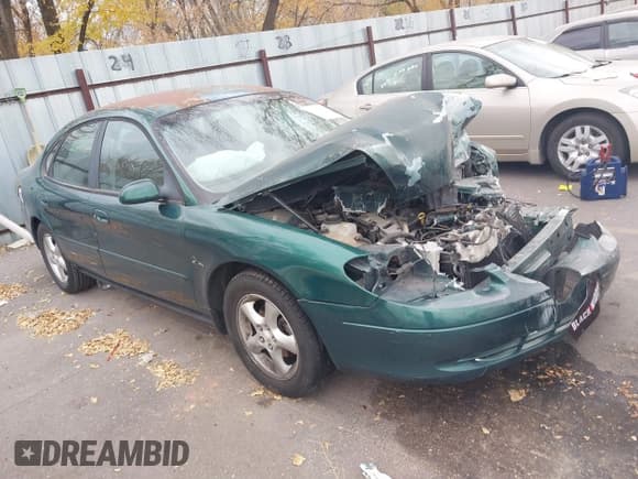 ✅ 2000 Ford Taurus SES • VIN: 1FAFP5528YG153182 • Lot: 43699811. Listed on IAAI with 100,265 mi. Free auction sales archive from the USA and detailed vehicle history report at DreamBid. Image 1.