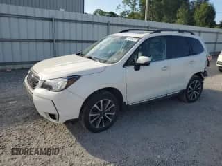 2018 Subaru Forester Touring с VIN JF2SJGWC9JH593863, выставлен на аукционе Copart как лот 65283225 с пробегом 50 130 миль миль и Списание • Salvage title. История ставок и продаж доступна на DreamBid. Изображение 1.