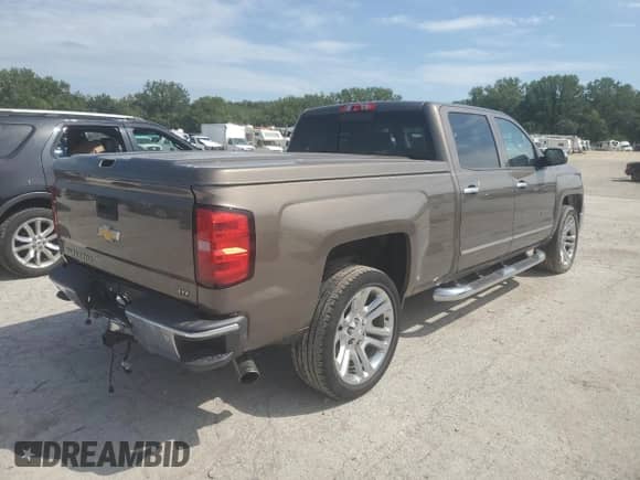 2014 Chevrolet Silverado 1500 LTZ with VIN 3GCUKSEC2EG128866, listed as a Copart auction lot 67001695 with 186,402 mi miles and Salvage title. Bid and sale history available at DreamBid. Image 3.