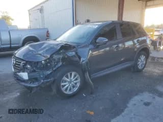 ✅ 2016 Mazda CX-5 Touring • VIN: JM3KE2CY1G0896558 • Lot: 92496255. Listed on Copart with 105,241 mi. Free auction sales archive from the USA and detailed vehicle history report at DreamBid. Image 1.