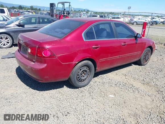✅ 2006 Kia Optima LX • VIN: KNAGE123065053853 • Lot: 42637683. Listed on IAAI with 173,332 mi. Free auction sales archive from the USA and detailed vehicle history report at DreamBid. Image 4.