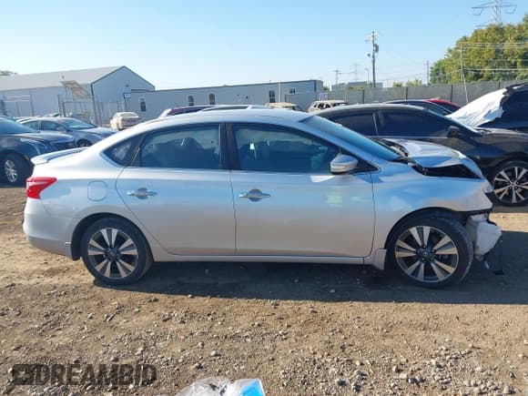 ✅ 2016 Nissan Sentra SV • VIN: 3N1AB7AP1GY273938 • Lot: 43102514. Listed on IAAI with 98,297 mi. Free auction sales archive from the USA and detailed vehicle history report at DreamBid. Image 14.