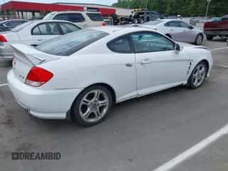 2006 Hyundai Tiburon GT с VIN KMHHN65F06U219476, выставлен на аукционе IAAI как лот 42763275 с пробегом 169 832 миль миль и . История ставок и продаж доступна на DreamBid. Изображение 4.