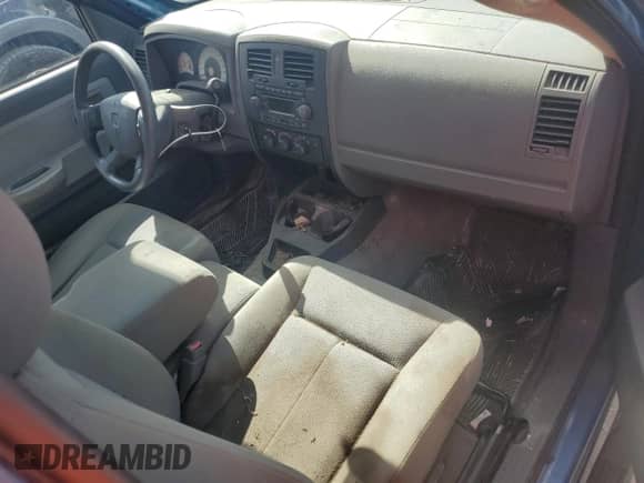 2006 Dodge Dakota ST с VIN 1D7HE22K46S676095, выставлен на аукционе Copart как лот 67142294 с пробегом 141 197 миль миль и Списание • Salvage title. История ставок и продаж доступна на DreamBid. Изображение 8.