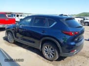 ✅ 2023 Mazda CX-5 S Carbon Edition • VIN: JM3KFBCM2P0250701 • Lot: 42272818. Listed on IAAI with 11,949 mi. Free auction sales archive from the USA and detailed vehicle history report at DreamBid. Image 15.