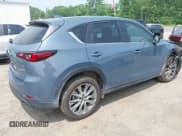 ✅ 2023 Mazda CX-5 S Carbon Edition • VIN: JM3KFBCM5P0179462 • Лот: 42451109. Опубликован ранее на IAAI с пробегом 14 170 миль. Бесплатный доступ к архиву аукционных продаж из США и подробный отчёт об истории автомобиля на DreamBid. Изображение 4.
