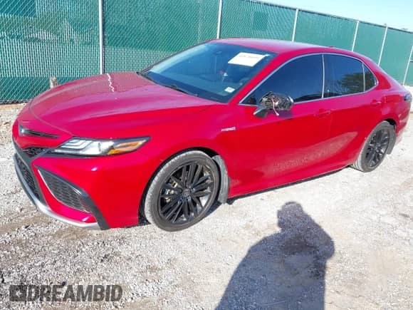 2021 Toyota Camry Hybrid XSE with VIN 4T1K31AK6MU030152, listed as a IAAI auction lot 41878099 with 81,333 mi miles and . Bid and sale history available at DreamBid. Image 17.