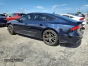 ✅ 2021 Audi S7 Prestige • VIN: WAUSFBF28MN077037 • Лот: 62517965. Опубликован ранее на Copart с пробегом 33 399 миль. Бесплатный доступ к архиву аукционных продаж из США и подробный отчёт об истории автомобиля на DreamBid. Изображение 2.