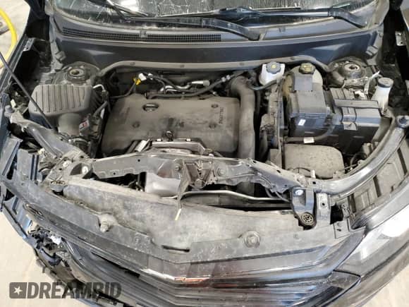 2020 Chevrolet Equinox LT z VIN 3GNAXVEX0LL149560, wystawiony jako Copart lot #70187975 z przebiegiem 52 072 mil mil oraz Szkoda całkowita • Salvage title. Historia ofert i sprzedaży dostępna na DreamBid. Obrazek 12.