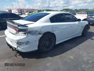 2020 Dodge Charger Scat Pack with VIN 2C3CDXGJ8LH127205, listed as a IAAI auction lot 43234717 with 63,867 mi miles and . Bid and sale history available at DreamBid. Image 4.