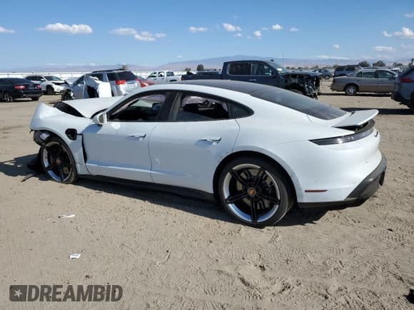 ✅ 2023 Porsche Taycan Turbo • VIN: WP0AC2Y13PSA52227 • Лот: 77098703. Опубликован ранее на Copart с пробегом Не указан. Бесплатный доступ к архиву аукционных продаж из США и подробный отчёт об истории автомобиля на DreamBid. Изображение 2.
