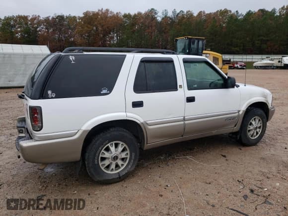 ✅ 2001 GMC Jimmy SLT • VIN: 1GKDT13W712155718 • Лот: 80688554. Опубликован ранее на Copart с пробегом 114 116 миль. Бесплатный доступ к архиву аукционных продаж из США и подробный отчёт об истории автомобиля на DreamBid. Изображение 3.