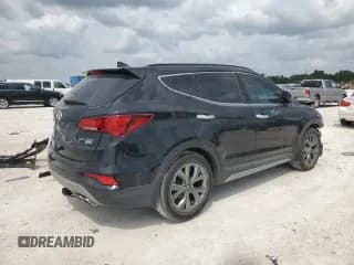 ✅ 2018 Hyundai Santa Fe Ultimate • VIN: 5NMZW4LA4JH100282 • Лот: 48676624. Опубликован ранее на Copart с пробегом 64 081 миль. Бесплатный доступ к архиву аукционных продаж из США и подробный отчёт об истории автомобиля на DreamBid. Изображение 3.