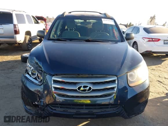 2012 Hyundai Santa Fe GLS z VIN 5XYZGDAB0CG096351, wystawiony jako IAAI lot #43476849 z przebiegiem 96 793 mil mil oraz . Historia ofert i sprzedaży dostępna na DreamBid. Obrazek 12.