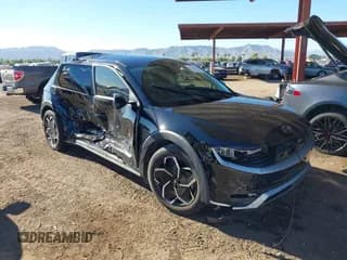 ✅ 2023 Hyundai Ioniq 5 SE • VIN: KM8KM4AE4PU186526 • Лот: 43348590. Опубликован ранее на IAAI с пробегом 26 965 миль. Бесплатный доступ к архиву аукционных продаж из США и подробный отчёт об истории автомобиля на DreamBid. Изображение 1.