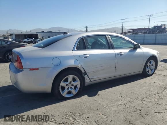 ✅ 2012 Chevrolet Malibu 1FL • VIN: 1G1ZA5E00CF261522 • Lot: 76960754. Listed on Copart with 188,742 mi. Free auction sales archive from the USA and detailed vehicle history report at DreamBid. Image 3.