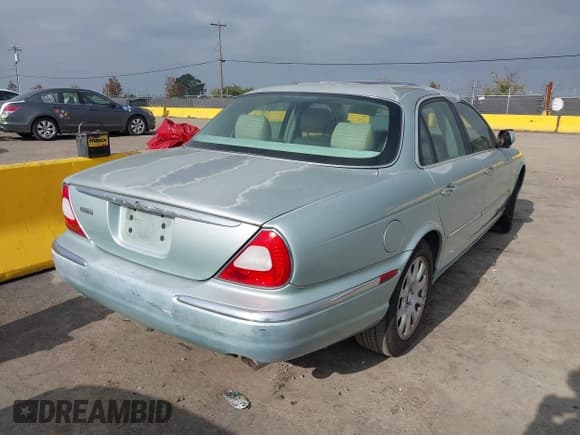 ✅ 2004 Jaguar XJ 8 • VIN: SAJWA71C94SG18179 • Лот: 43809979. Опубликован ранее на IAAI с пробегом 189 015 миль. Бесплатный доступ к архиву аукционных продаж из США и подробный отчёт об истории автомобиля на DreamBid. Изображение 6.